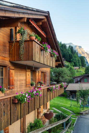 Beautiful rustic mountain village of Wengen on Bernese Oberland in the evening at Canton of Bern, Switzerland